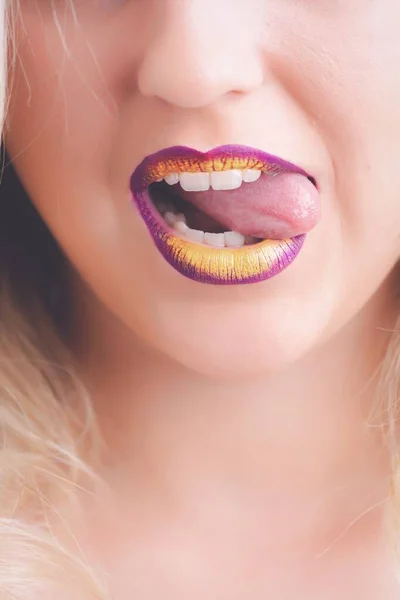 Vertical Closeup Shot Female Purple Yellow Lipstick Flirtatiously Licking Her — Stock Photo, Image