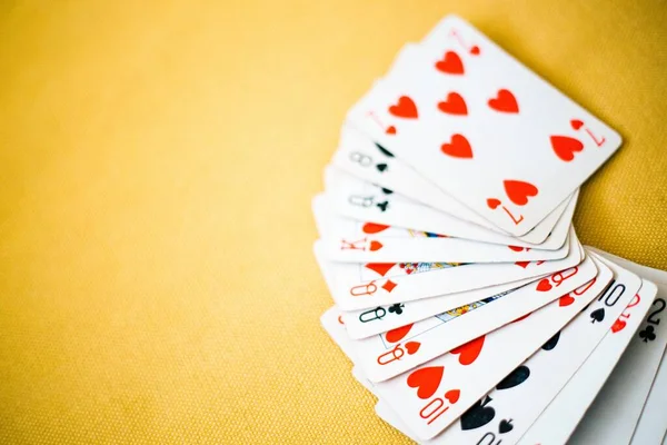 Closeup shot of playing cards on the table - perfect for a cool wallpaper or background — 스톡 사진