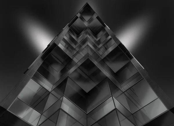 Escala gris plano de ángulo bajo de un edificio de vidrio en forma de pirámide —  Fotos de Stock