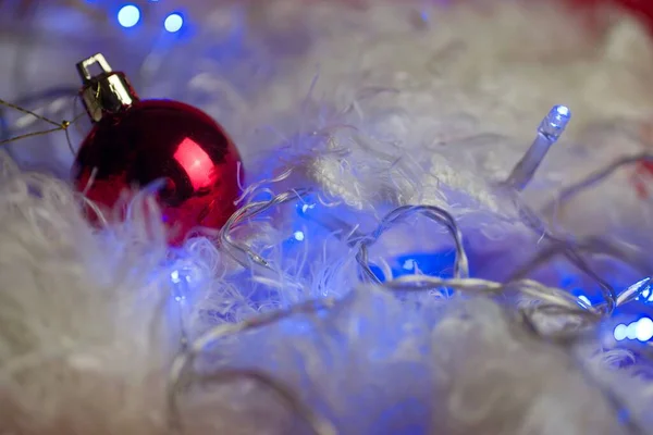 Closeup Shot Red Christmas Decoration Next Lights Artificial Snow — Stock Photo, Image