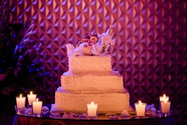 Closeup Three Tiered Square Wedding Cake Surrounded Candles Figurine Couple — Stock Photo, Image