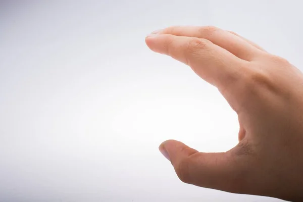 Nahaufnahme Einer Menschlichen Hand Vor Weißem Hintergrund — Stockfoto