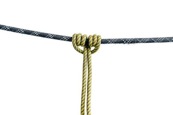 Prusik Prussk と呼ばれる特別な結び目やヒッチ 岩登りや登山で使用される摺動摩擦のヒッチ クライミングロープの上のプリスクループ — ストック写真