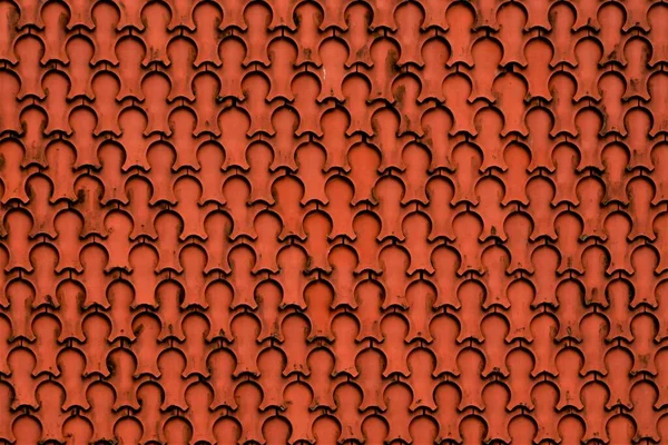 Nahaufnahme Einer Roten Oberfläche Mit Nahezu Runden Mustern — Stockfoto