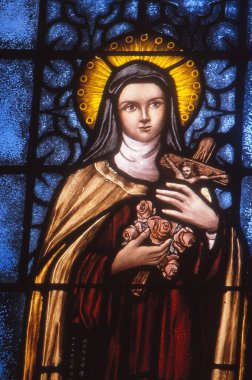 LOS ANGELES, UNITED STATES - Apr 19, 1989: Stained Glass portrait of Saint Teresa of Avila. clipart