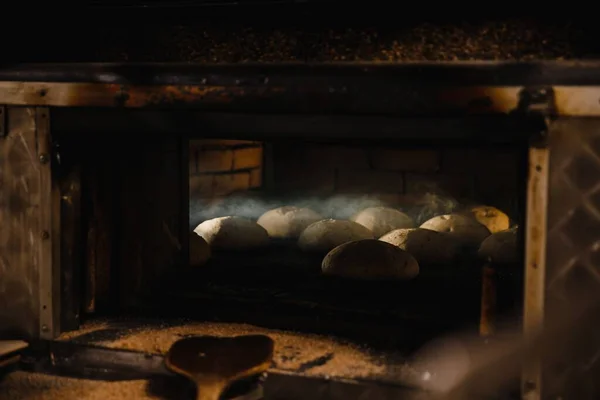 Closeup Shot Raw Bread Baking Oven — Stock Photo, Image