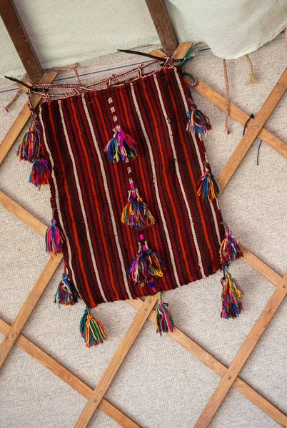 Vertical Shot Piece Red Striped Fabric Colorful Needles Hanging — Stock Photo, Image