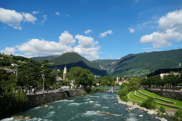 stock image MERANO, ITALY - May 20, 2020: The popular spot for relaxing by the river Passer in Merano, Italy remains closed in May 2020. No people. Anti COVID-19 regulation is still applied.