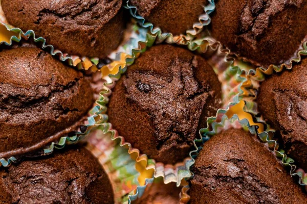 High Angle Shot Yummy Chocolate Cupcakes Thin Colorful Papers — Stock Photo, Image