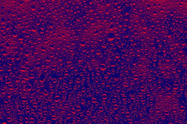 青い表面に水滴のクローズアップショット — ストック写真