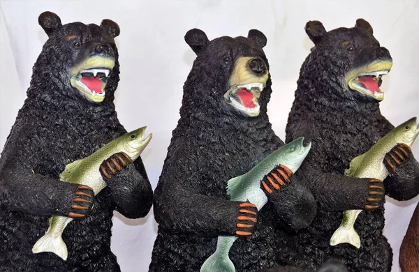 Closeup View Statues Three Black Bears Each Holding Fish Hand — Stock Photo, Image