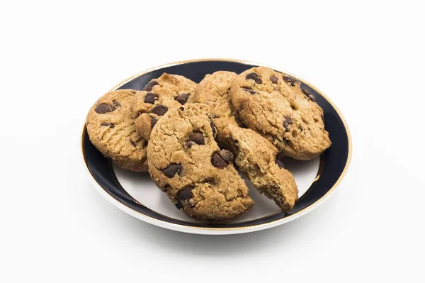 Tiro Close Biscoitos Uma Pequena Placa Isolada Fundo Branco — Fotografia de Stock