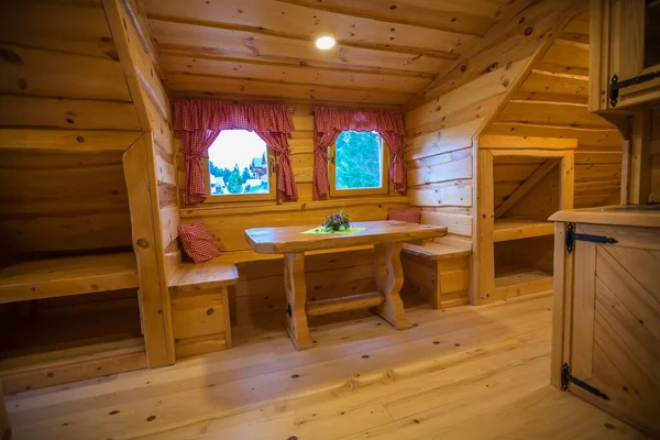 The interior of a log cabin accommodation at Lake Bloke, Nova Vas, Slovenia