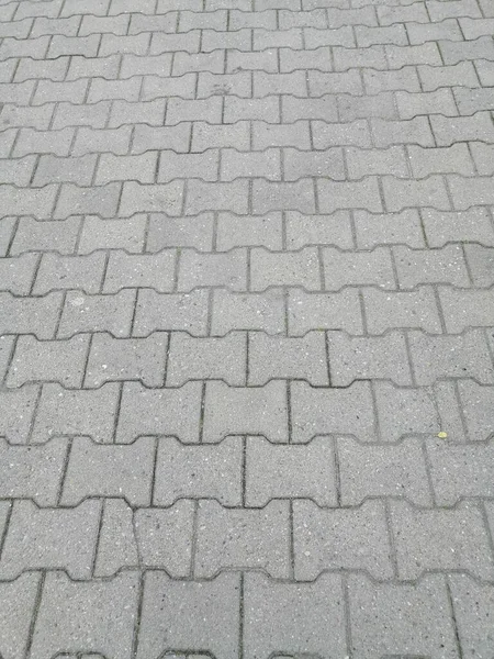 昼間の石畳の地面の垂直ショット — ストック写真