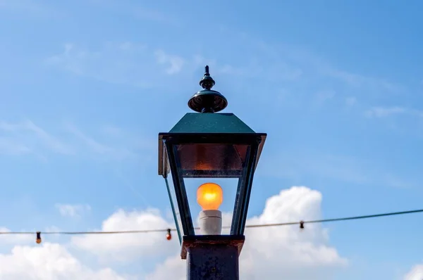 Closeup Shot Lighted Lamp Post Cloudy Sky Background — Stock Photo, Image
