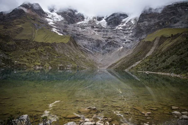 A scenic view of a crystal lake in Mountain Machu Picchu in Peru