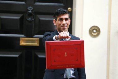 LONDON, UNITED KINGDOM - Mar 11, 2020: Rishi Sunak, Chancellor of the Exchequer, leaves No.11 Downing Street to present his budget at the House of Commons in London, UK. clipart