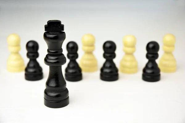 Closeup Chess Pieces Black King Front Isolated Grey Background Concept — Stock Photo, Image