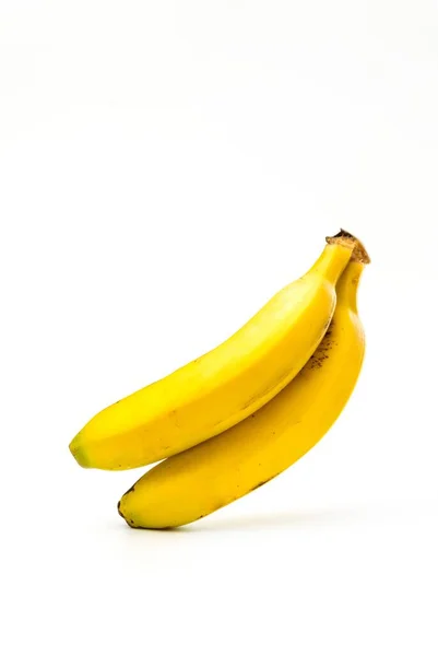 白地に隔離された黄色のバナナ — ストック写真