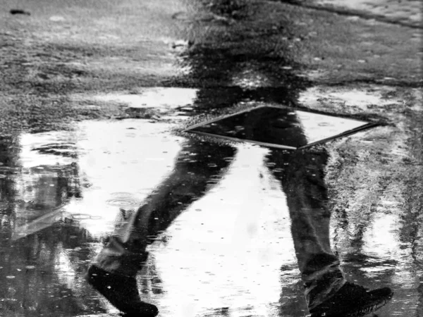 Close Grey Scale Shot Human Silhouette Reflected Wet Floor — Stock Photo, Image