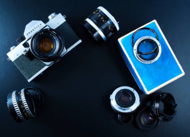 GRAVESEND, UNITED KINGDOM - Jun 13, 2020: Old Vintage Camera And Lenses And Glass Ring Parts clipart