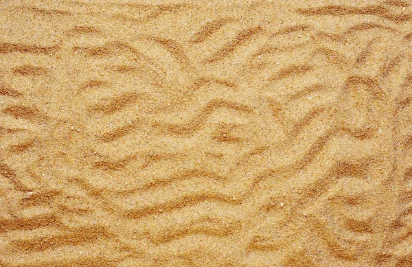 Ένα Πλάνο Υψηλής Γωνίας Μοτίβων Και Υφών Στην Καλυμμένη Άμμο — Φωτογραφία Αρχείου