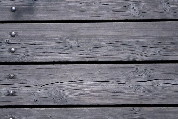 Eine Graue Holzstruktur Mit Schrauben Auf Den Waagerechten Planken — Stockfoto