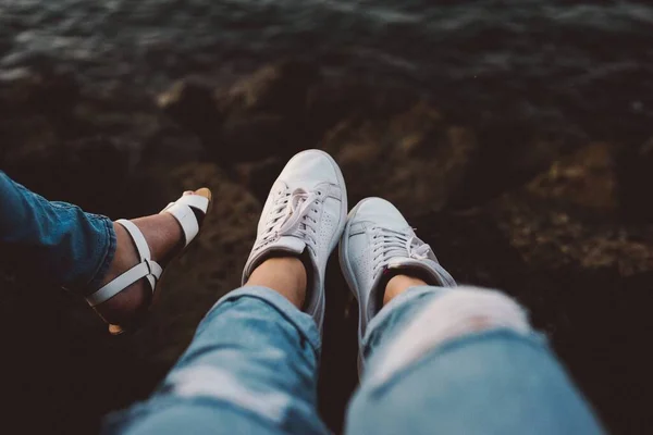 Selective Focus Shot Female Legs Ripped Jeans White Sneakers Other — Stock Photo, Image