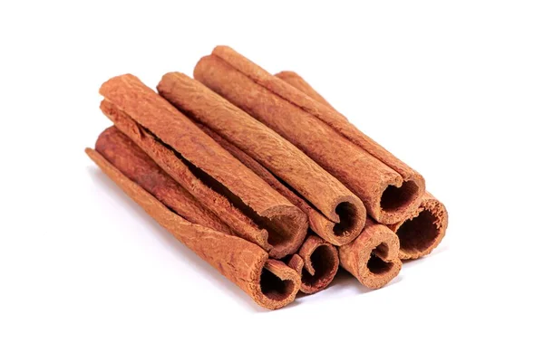 Closeup Cinnamon Sticks Lights Isolated White Background — Stock Photo, Image