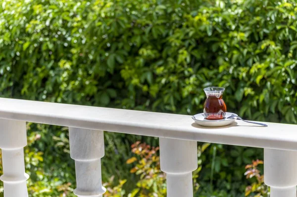 Closeup Shot Glass Cup Tea Balcony Trees Background — Stock Photo, Image