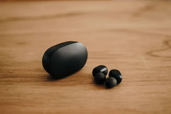 Closeup Shot Two Modern Wireless Black Earbuds Black Earbud Case — Stock Photo, Image