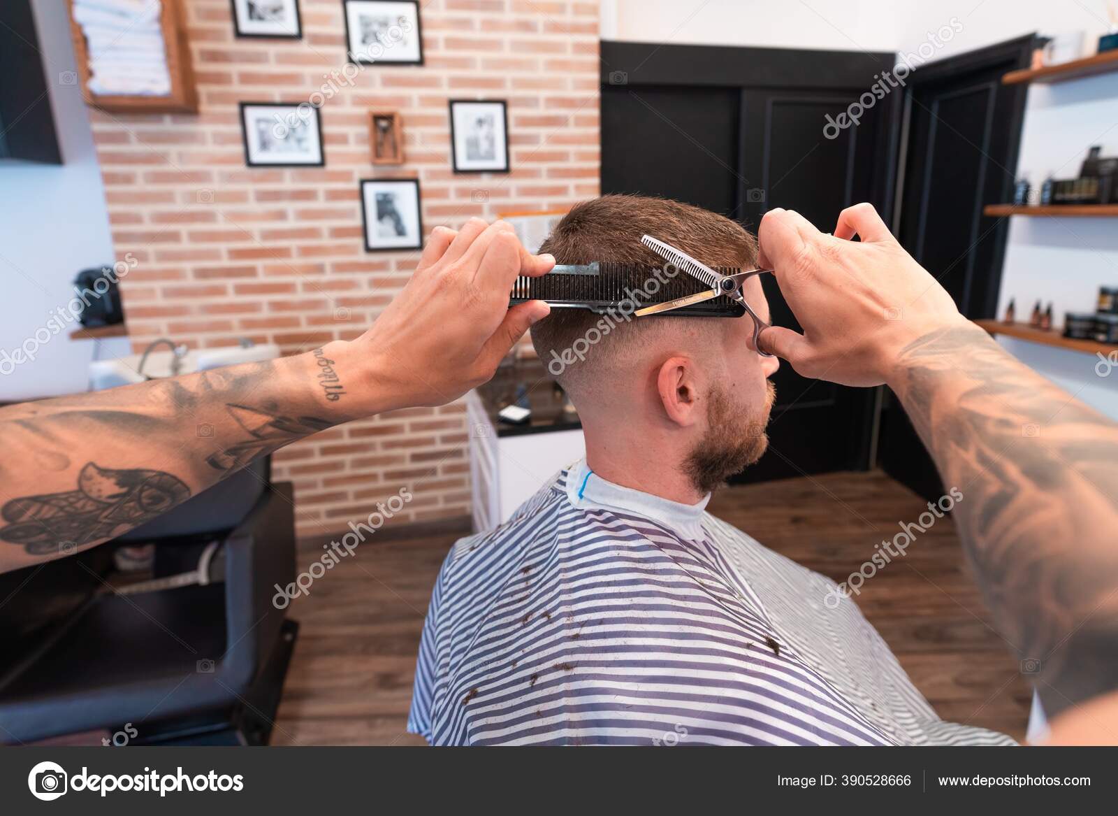 Premium Photo | Professional tattooed barber using cutthroat razor cutting  hair attractive male is getting a modern