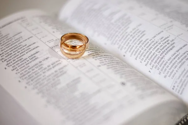 Closeup Shot Two Golden Rings Opened Book Marriage Concept — Stock Photo, Image