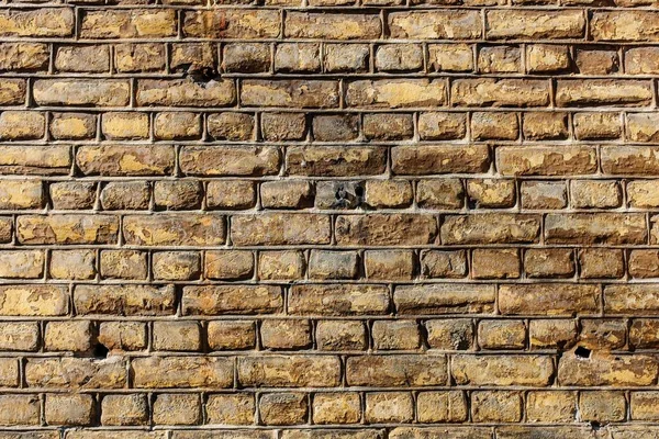 Uma Parede Feita Pedras Retangulares Marrons — Fotografia de Stock