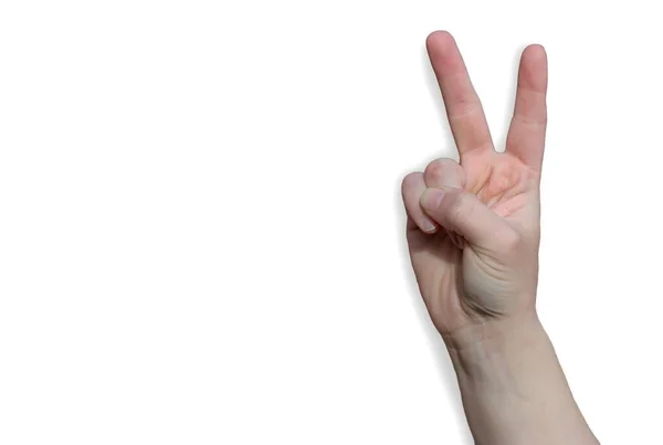 用手指在白色背景上做胜利或和平手势的举起的手臂 — 图库照片