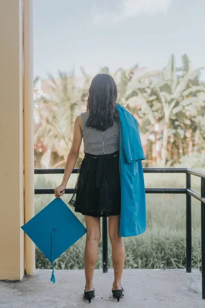 Rearview Portrait Beautiful Filipino Woman Wearing Her Graduation Gown While — Stock Photo, Image