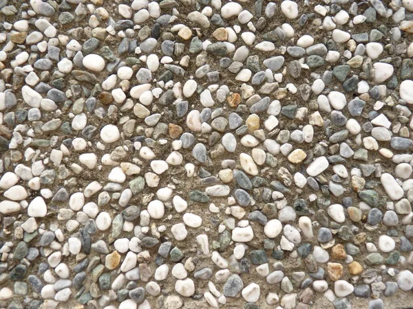 Tiro Close Uma Parede Com Pedras Seixos — Fotografia de Stock