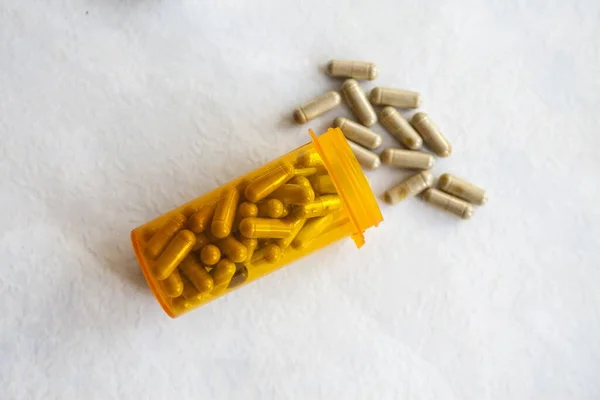 Overhead Shot Pills Spilled Orange Container Isolated White Surface — Stock Photo, Image