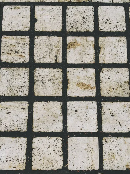 Tiro Vertical Chão Com Pedras Quadradas Brancas — Fotografia de Stock