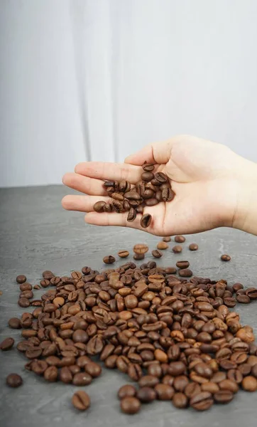 Selective Focus Shot Female Hand Sprinkling Roasted Coffee Beans Wooden — Stock Photo, Image