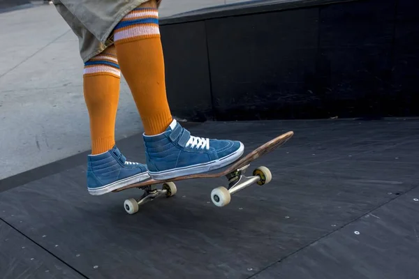 Closeup Male Legs Orange Socks Blue Shoes Skateboard — Stock Photo, Image