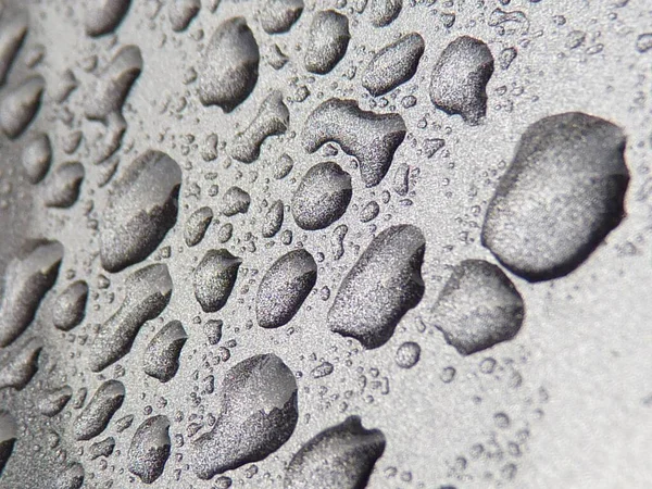 Primo Piano Gocce Acqua Una Superficie Grigia — Foto Stock