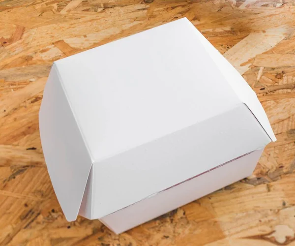 Белая Самособранная Коробка Деревянном Фоне — стоковое фото