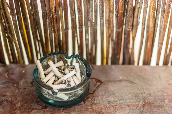 Poznan Poland Jul 2020 Used Cigarettes Buds Glass Tray Wooden — Stock Photo, Image