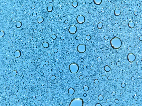 Closeup Shot Water Drops Glass Surface Blue Textures — Stock Photo, Image