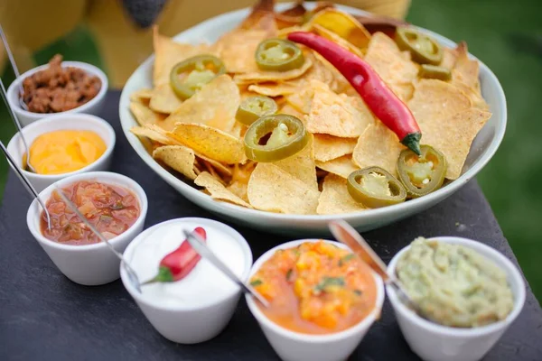 Closeup Shot Bowl Tortilla Chips Jalapeno Peppers Different Sauces — Stock Photo, Image