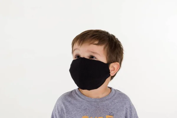 Portrait Hispanic Child Wearing Black Medical Face Mask Prevent Spread — Stock Photo, Image