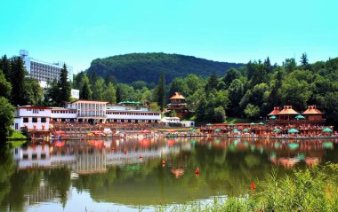The Sovata resort near the Bear Lake in Romania with reflections in the water clipart