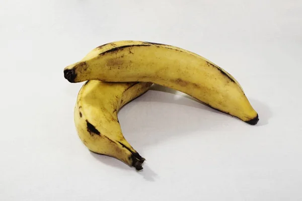 Duas Bananas Com Algumas Marcas Pretas Isoladas Fundo Branco — Fotografia de Stock