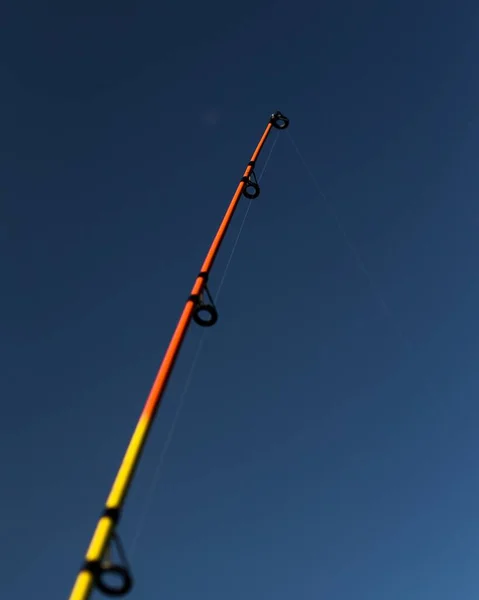 Low Angle Shot Colorful Fishing Rod Blue Sky Background — Stock Photo, Image